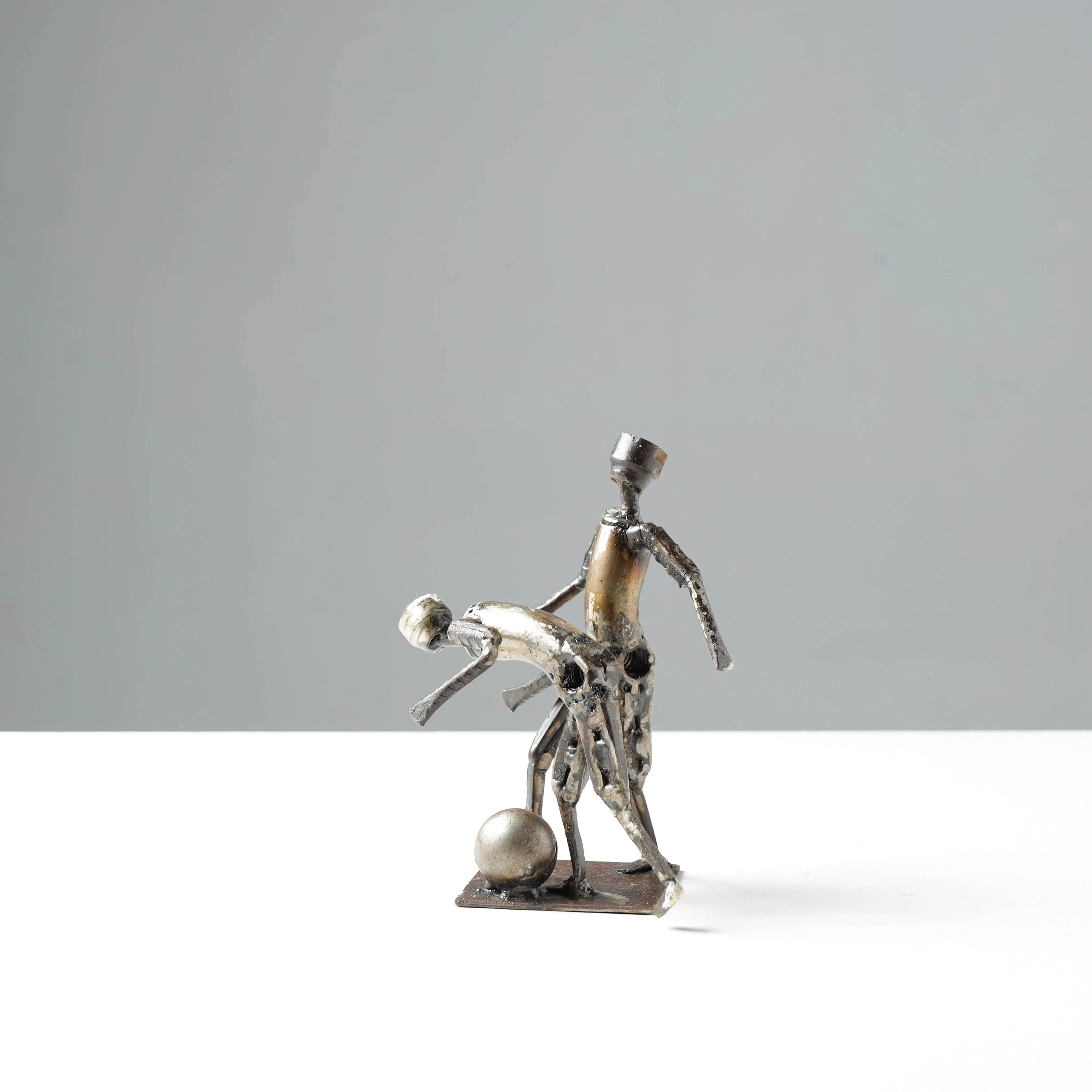 Football Players - Handmade Recycled Metal Sculpture by Debabrata Ruidas